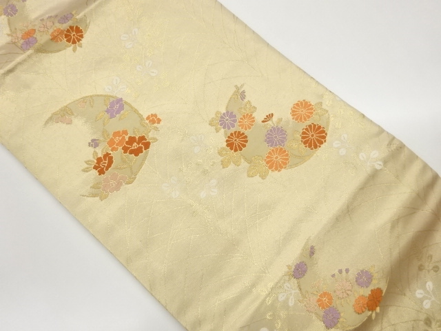 変わり丸文に草花模様織出し名古屋帯